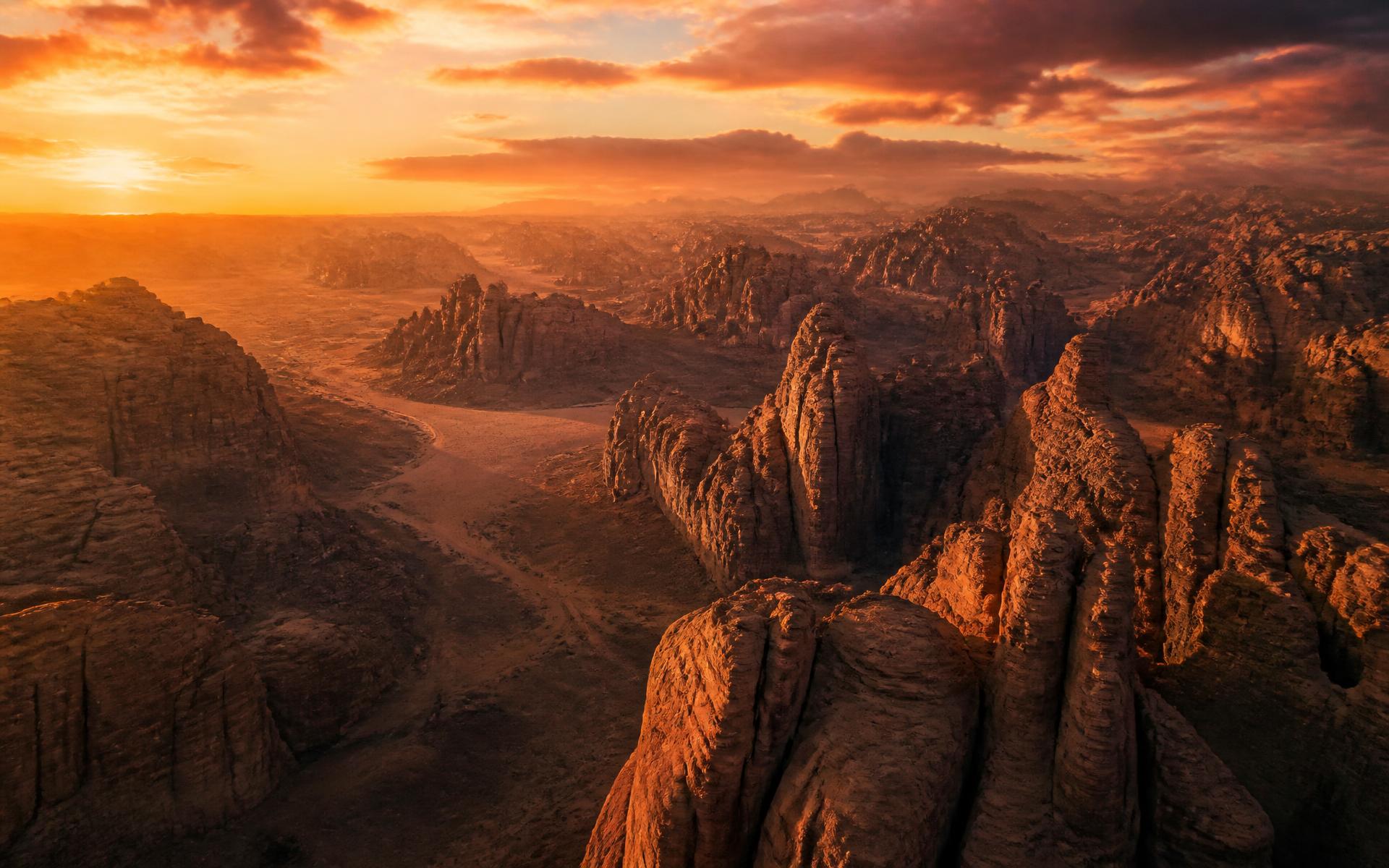 AlUla sandstone canyons at golden hour